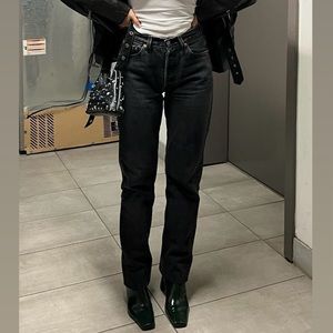 Vintage Levi’s 501 high-waisted black jeans. 🖤